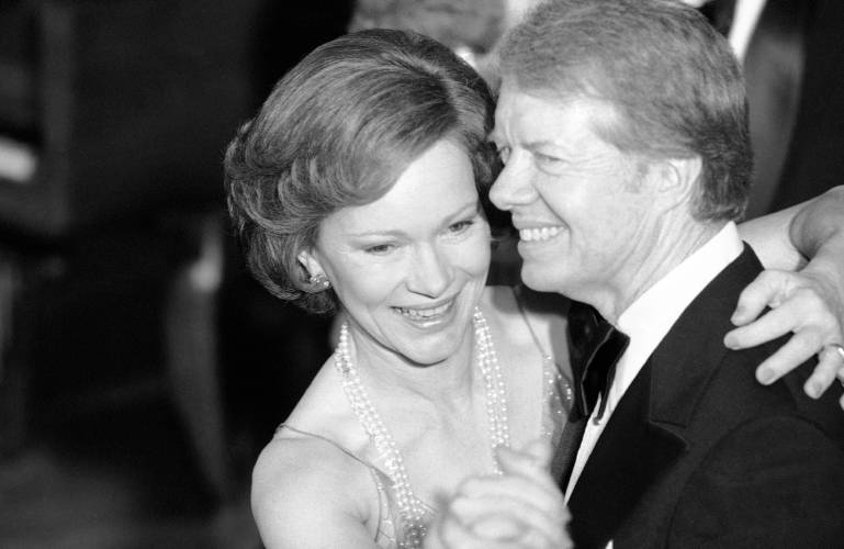 FILE - In this Dec. 13, 1978, file photo, President Jimmy Carter and his wife Rosalynn lead their guests in dancing at the annual Congressional Christmas Ball at the White House in Washington. Jimmy and Rosalynn are celebrating their 77th wedding anniversary, Friday, July 7, 2023. Jimmy and Rosalynn Carter have been best friends and life mates for nearly 80 years. Now with the former first lady's death at age 96, the former president must adjust to life without the woman who he...