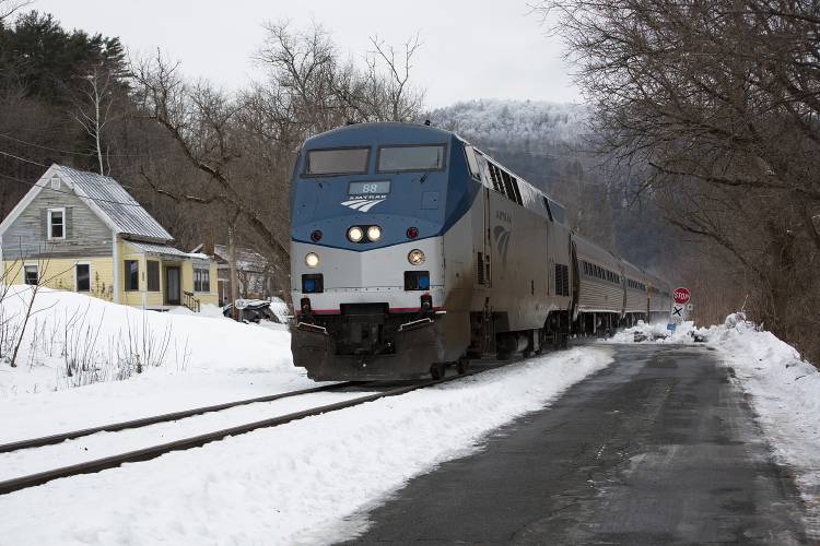 A southbound Amtrak train crosses Acton Place in South Royalton, Vt., on Wednesday, Jan. 31, 2024. A 92-year-old woman from Massachusetts died after a freight train collided with her car at 3:15 a.m. Wednesday. (Valley News / Report For America - Alex Driehaus) Copyright Valley News. May not be reprinted or used online without permission. Send requests to permission@vnews.com.