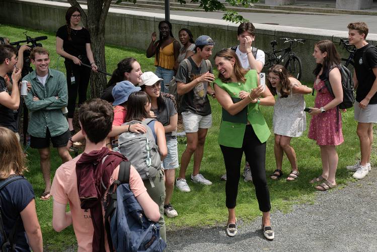 Dartmouth College President Sian Beilock takes selfies with students during a lunch event on campus in Hanover, N.H., on Wednesday, July 12, 2023. (Valley News - James M. Patterson) Copyright Valley News. May not be reprinted or used online without permission. Send requests to permission@vnews.com.