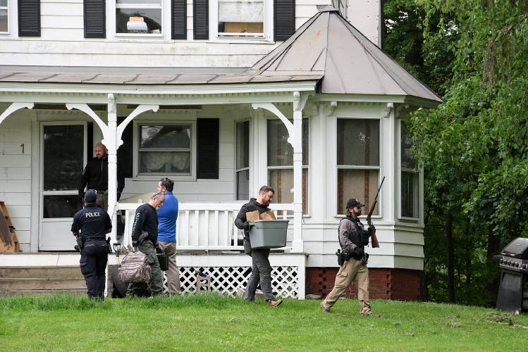 Police remove evidence from an apartment on Hartford Avenue near Hartford High School in White River Junction, Vt., following a search on Wednesday, June 7, 2023. (Valley News - James M. Patterson) Copyright Valley News. May not be reprinted or used online without permission. Send requests to permission@vnews.com.