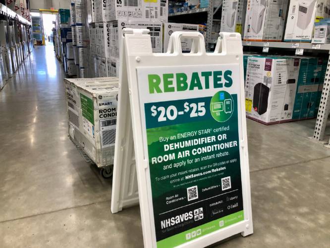  The NHSaves program advertises rebates for Energy Star certified dehumidifiers and air conditioners at Lowe’s. (Hadley Barndollar | New Hampshire Bulletin)