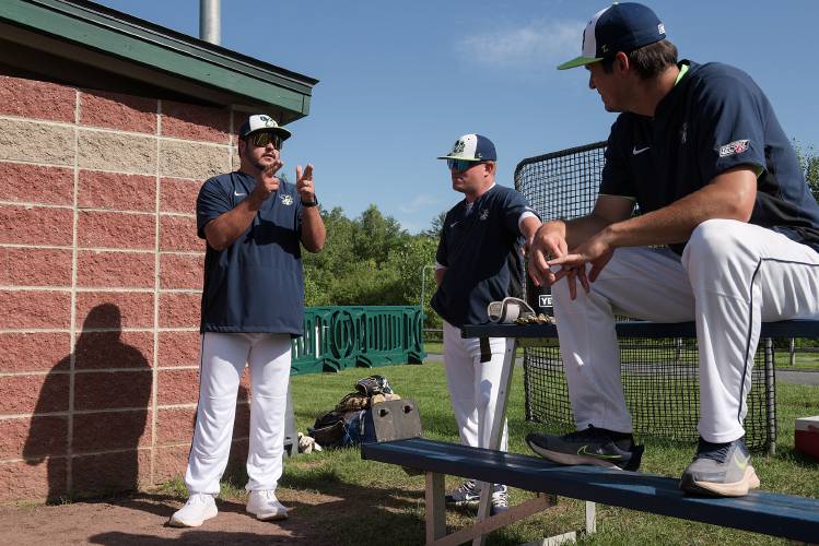 Nighthawks hitting coach Garrett Nance, left, talks with manager Mat Pause, middle, and pitching coach Chad Sturgeon, right, before their game with Sanford at Maxfield Sports Complex in Hartford, Vt., on Thursday, July 20, 2023. (Valley News - James M. Patterson) Copyright Valley News. May not be reprinted or used online without permission. Send requests to permission@vnews.com.