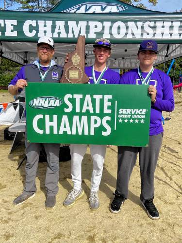 Mascoma Valley Regional High School bass fishing coach Eric Moulton and student athletes Tanner Moulton and Maliky Bates hold a state championship banner after winning the state bass fishing tournament for the first time. (Mascoma Valley Regional School District photograph)