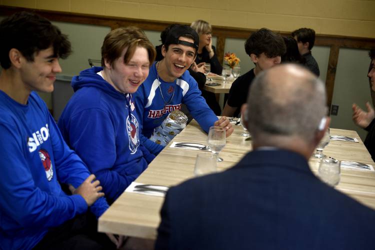 After hearing oral arguments for two cases and a question and answer period, Vermont Supreme Court Justices have lunch with Hartford High School students in White River Junction, Vt., on Thursday, Oct. 26, 2023. Associate Justice William Cohen speaks with students Brayden Trombly, Frank Cushing and Payton Bessette. (Valley News - Jennifer Hauck) Copyright Valley News. May not be reprinted or used online without permission. Send requests to permission@vnews.com.