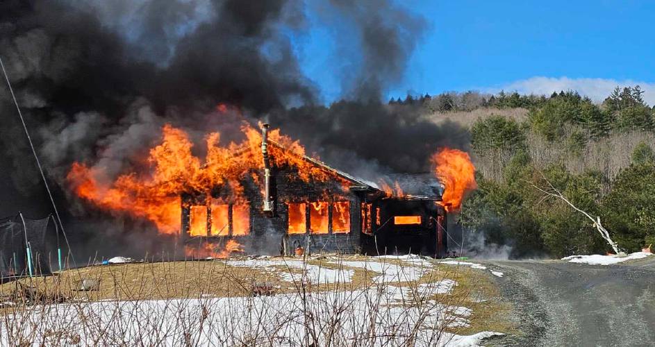 The home of Evan Burnham and Erica Brinkman burns in Royalton, Vt., on Saturday, March 31, 2024. The home is a total loss. Photo courtesy of Evan Burnham