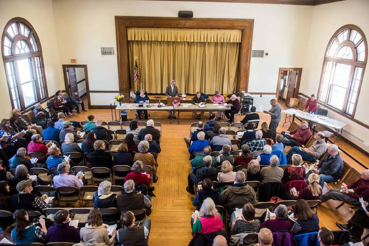 Voters attend West Windsor's Town Meeting at Story Memorial Hall in West Windsor, Vt., on March 6, 2018. (Valley News - Carly Geraci) Copyright Valley News. May not be reprinted or used online without permission. Send requests to permission@vnews.com.