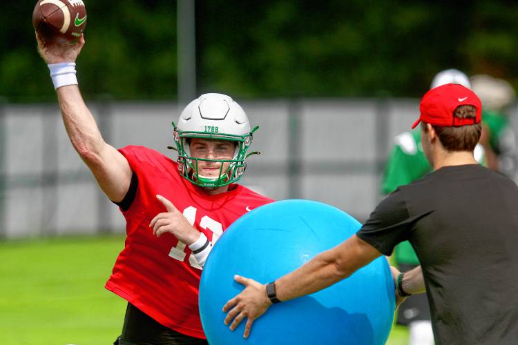Dartmouth College freshman quarterback Woods Ray, a native of Homewood, Ala., throws a pass during an Aug. 21, 2023, practice on the Blackman Fields. (Valley News - Tris Wykes) Copyright Valley News. May not be reprinted or used online without permission. Send requests to permission@vnews.com.