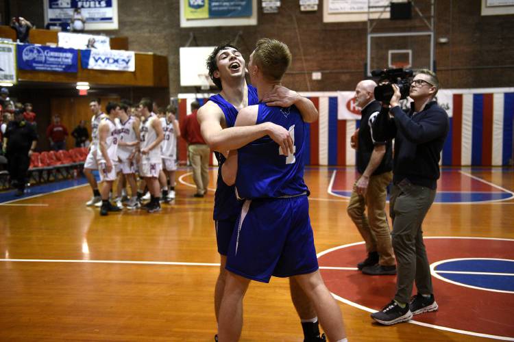 Thetford teammates Mitchell Parkman and Hunter Clay celebrate their VPA D-III boys basketball state championship win against Hazen in Barre, Vt., on Saturday, March 2, 2024. Thetford won, 57-53. (Valley News - Jennifer Hauck) Copyright Valley News. May not be reprinted or used online without permission. Send requests to permission@vnews.com.