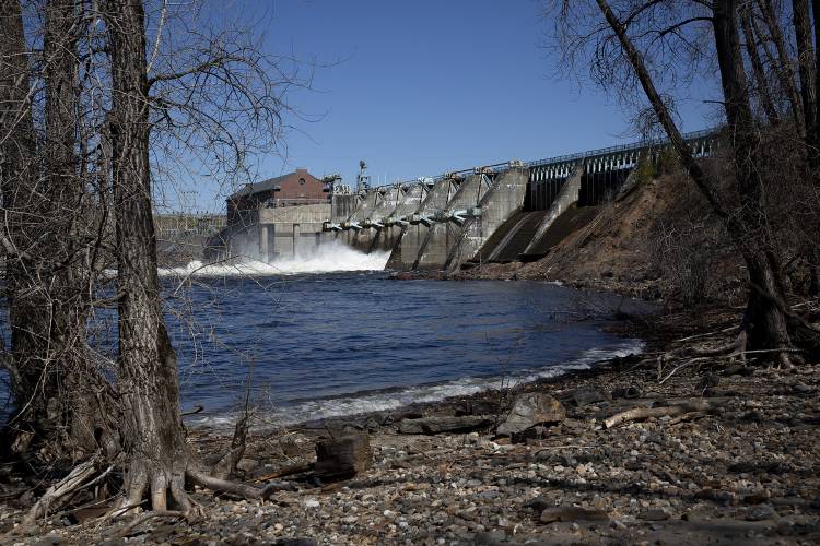 The Wilder Dam, seen from a portage trail in West Lebanon, N.H., on Tuesday, April 9, 2024. The Federal Energy Regulatory Commission is accepting public comment on the relicensing of the dam, which is owned and operated by HydroQuebec subsidiary Great River Hydro, until April 12 at 5 p.m. (Valley News / Report For America - Alex Driehaus) Copyright Valley News. May not be reprinted or used online without permission. Send requests to permission@vnews.com.