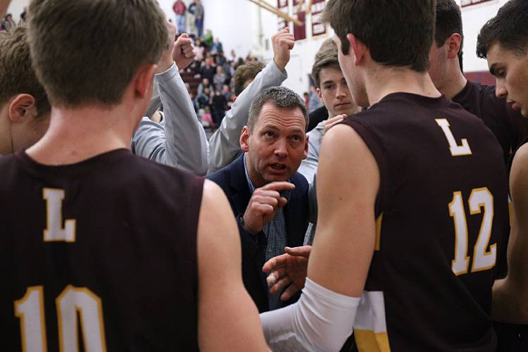 Lebanon boys basketball coach Kieth Matte gives his team encouragement during a timeout in their game against Hanover in Hanover, N.H., on March 5, 2020. (Valley News - Geoff Hansen) Copyright Valley News. May not be reprinted or used online without permission. Send requests to permission@vnews.com.