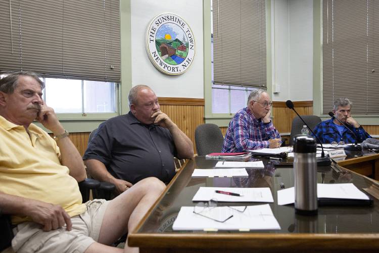 From left, Newport Selectboard members Jeffrey Kessler, Vice Chairman James Burroughs, Chairman Barry Connell and Keith Sayer listen to comments from members of the Newport School Board during a meeting in Newport, N.H., on Monday, June 19, 2023. Connell said at the start of the meeting that it was his opinion that the Selectboard needed to reconsider its position that a Town Meeting petition article allowing the school district to lease two bus bays for 99 years for $1 was not enforceable. “You can be legally right and you can be wrong at the same time,” he said. (Valley News / Report For America - Alex Driehaus) Copyright Valley News. May not be reprinted or used online without permission. Send requests to permission@vnews.com.