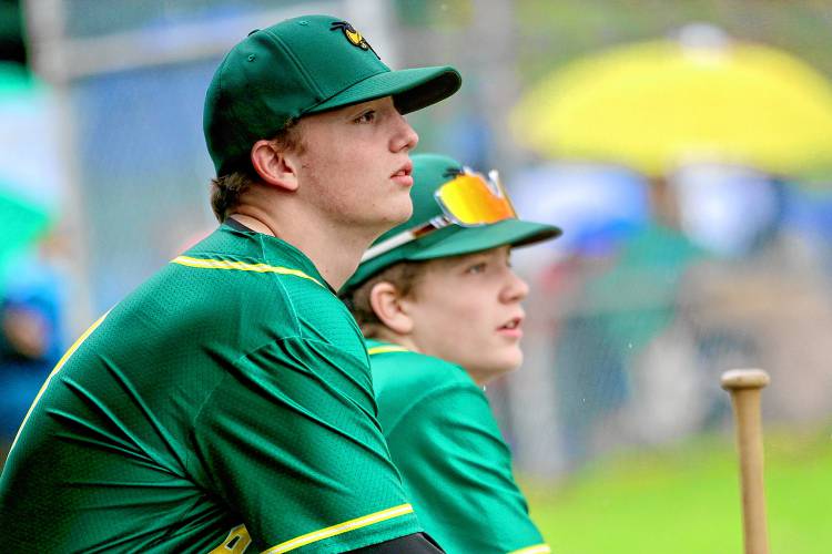 Windsor High baseball teammates Morgan Johnson, left, and Joey Gaudette watch a fly ball during their team's 18-0 loss to Hartford on April 15, 2024, in Windsor, Vt. (Valley News - Tris Wykes) Copyright Valley News. May not be reprinted or used online without permission. 