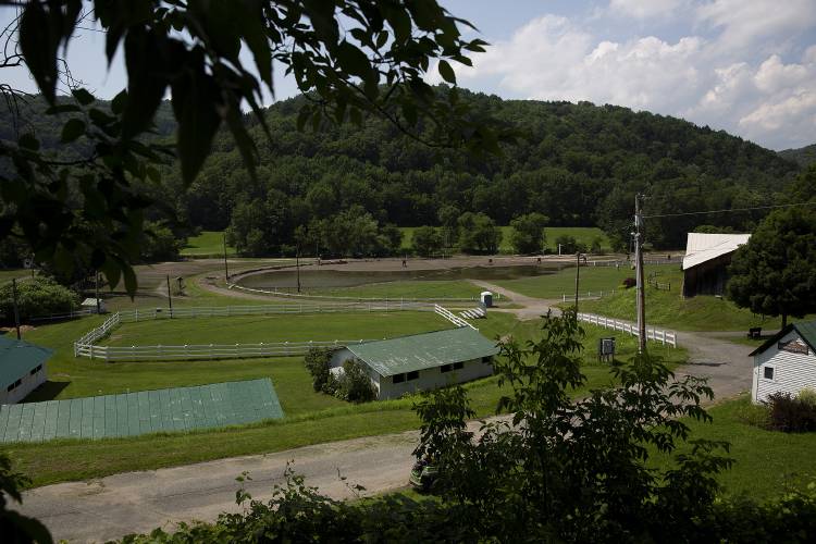 A portion of the racetrack remains flooded at the fairgrounds in Tunbridge, Vt., on Thursday, July 13, 2023. (Valley News / Report For America - Alex Driehaus) Copyright Valley News. May not be reprinted or used online without permission. Send requests to permission@vnews.com.