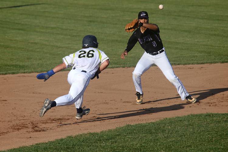 Upper Valley Nighthawks' Christopher Worcester, left, is caught in a rundown by Keene Swamp Bats shortstop Ramses Cordova during their game in White River Junction, Vt., on June 15, 2023. Worcester slid safely back to second base under Cordova's tag. The Nighthawks won, 4-3. (Valley News - Geoff Hansen) Copyright Valley News. May not be reprinted or used online without permission. Send requests to permission@vnews.com.