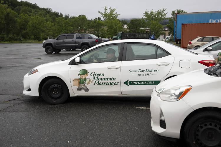 Norbert Jarvis, 74, of Weathersfield, Vt., heads out for his twice-weekly messenger drive from the parking lot at Vital Delivery Solutions in West Lebanon, N.H., on Friday, August 25, 2023. Jarvis recently moved in with his daughter after his wife’s death in April and said he tries to help her with expenses. (Valley News / Report For America - Alex Driehaus) Copyright Valley News. May not be reprinted or used online without permission. Send requests to permission@vnews.com.
