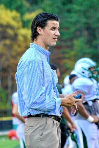 Joey McIntyre, Dartmouth College's director of football operations, watches an Oct. 15, 2015, practice on the Blackman Fields in Hanover, N.H.