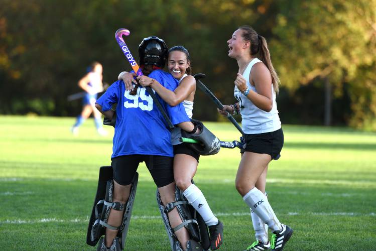 Woodstock's Aleks Cirovic hugs goalie Paige Stone after their goal to tie the game with Hartford on Wednesday, Oct. 4, 2023, in Woodstock, Vt. On the right is Woodstock's Laura Audsley. Woodstock won, 2-1, in overtime. (Valley News - Jennifer Hauck) Copyright Valley News. May not be reprinted or used online without permission. Send requests to permission@vnews.com.