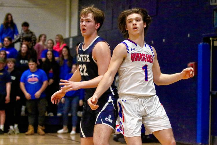 Hartford High's Brody Tyburski, right, is one of the Upper Valley's best players in the paint. The football standout brings the Hurricanes a physical presence under the basket.