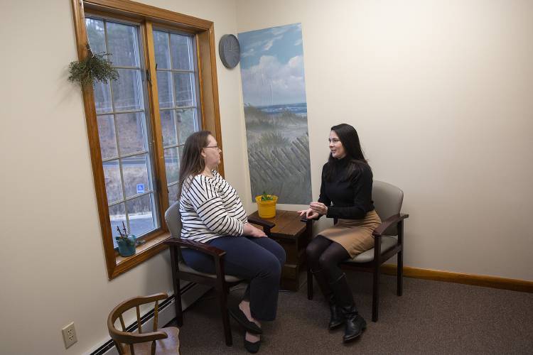 Clinical Social Worker Krista LaFont-Leamey, left, and Primary Care Nurse Practitioner Jillian Rafter sit in LaFont-Leamey’s office at Valley Primary Care Family Medicine and Pediatrics in Claremont, N.H., on Wednesday, Dec. 13, 2023. The post-sentencing integrated care program the pair developed has been in place for about a year, serving 30 formerly incarcerated patients. (Valley News / Report For America - Alex Driehaus) Copyright Valley News. May not be reprinted or used online without permission. Send requests to permission@vnews.com.