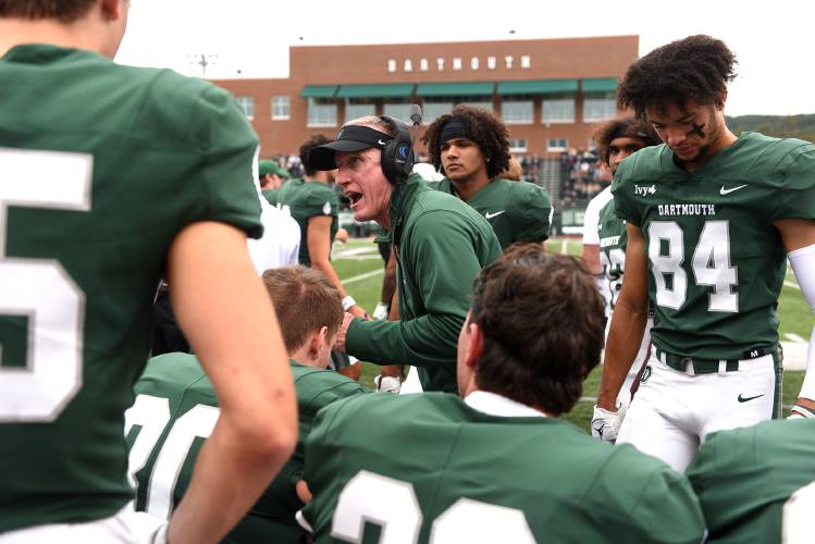 Dartmouth Interim Head Coach Sammy McCorkle talks to his players in the first half of their game with Lehigh on Saturday, Sept. 23, 2023 in Hanover, N.H. Before the start of the game there was a moment of silence for head coach Buddy Teevens who died this week after March bicycle crash in Florida. Dartmouth won 34-17. (Valley News - Jennifer Hauck) Copyright Valley News. May not be reprinted or used online without permission. Send requests to permission@vnews.com.