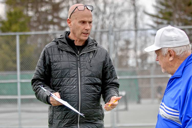 Lebanon High girls tennis coach Rob Johnstone, left, speaks with Kearsarge counterpart Bob 