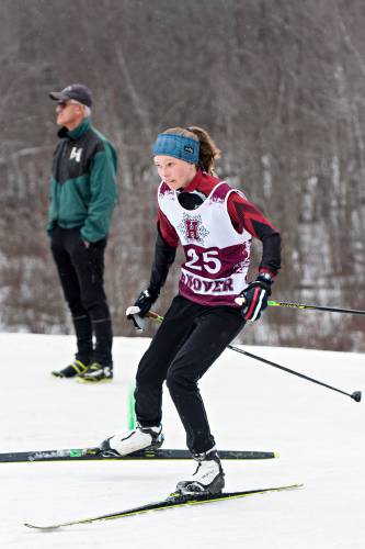 Heidi Davis, of Hanover, crosses the finish at the NHIAA Nordic skiing Meet of Champions at Proctor Academy in Andover, N.H., on Tuesday, March 15, 2022. Davis posted a combined time of of 24:33.8 in the classic and skate portions of the event. (Valley News - James M. Patterson) Copyright Valley News. May not be reprinted or used online without permission. Send requests to permission@vnews.com.