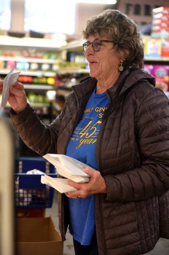 Janet Hardy, of Strafford, Vt. chats with Melvin Coburn while ordering deli meats at the store on Wednesday, Jan. 24, 2024, in South Strafford, Vt. The Coburn family is looking to sell the store -- the Strafford Community Trust is rasing money to purchase the operation.  (Valley News - Jennifer Hauck) Copyright Valley News. May not be reprinted or used online without permission. Send requests to permission@vnews.com.