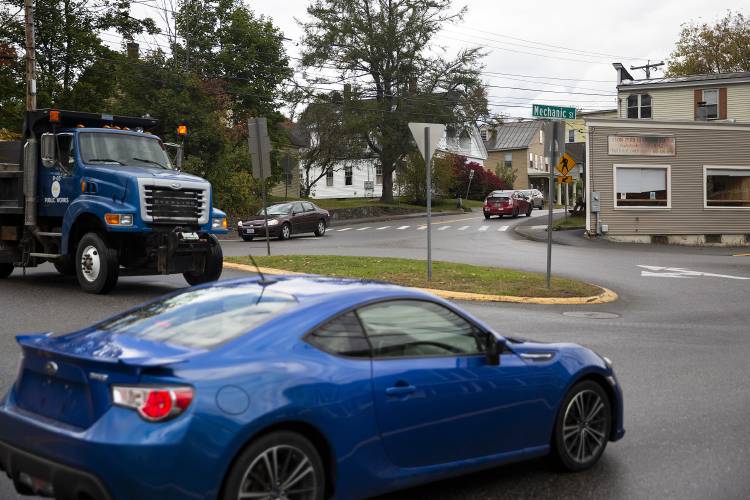 Drivers maneuver through traffic at the intersection of High, Mascoma and Mechanic streets in Lebanon, N.H., on Thursday, Oct. 12, 2023. The city is working on an infrastructure project to replace the intersection with a roundabout, with construction expected to begin in the spring of 2024 and continue through the summer of 2025. (Valley News / Report For America - Alex Driehaus) Copyright Valley News. May not be reprinted or used online without permission. Send requests to permission@vnews.com.