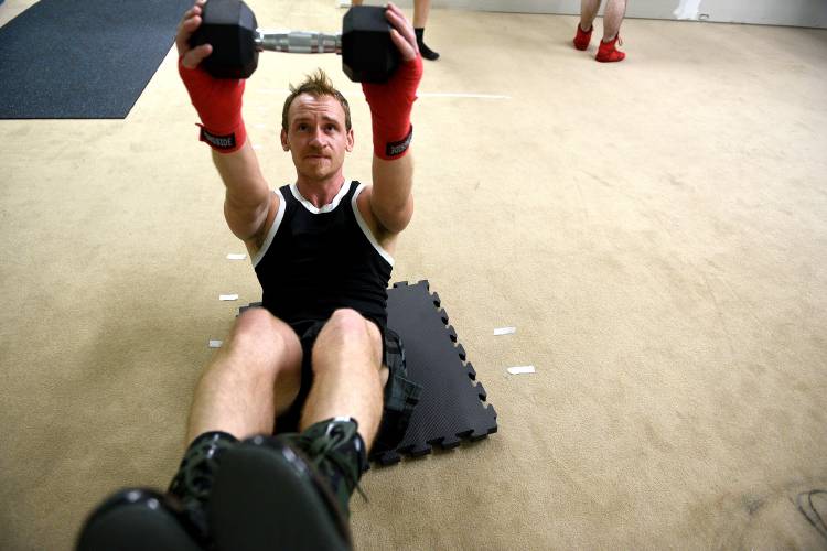 Nicholas Kane, of White River Junction, Vt. trains at Real Steel Fitness in Claremont, N.H. on Wednesday, July 26, 2023. 
 (Valley News - Jennifer Hauck) Copyright Valley News. May not be reprinted or used online without permission. Send requests to permission@vnews.com.