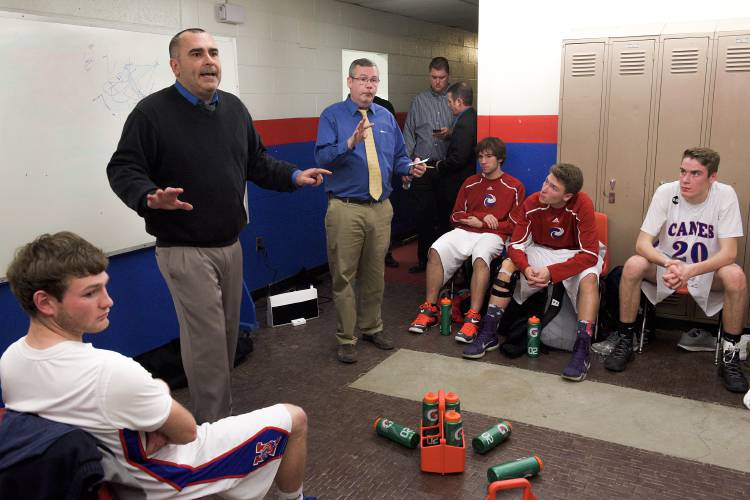 Hartford boys basketball coach Steve Landon talks with his team during half-time of a game with Windsor at Hartford High School in White River Junction, Vt., in January 2017. Hartford won. (Valley News - James M. Patterson) Copyright Valley News. May not be reprinted or used online without permission. Send requests to permission@vnews.com.