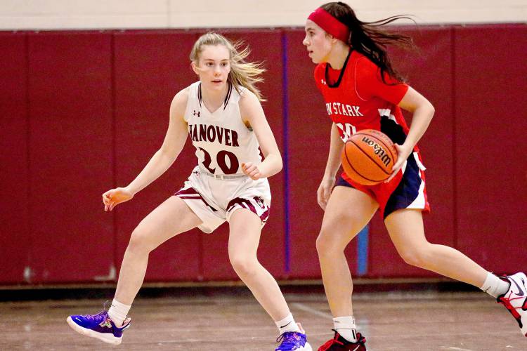 Hanover High's Sydney McLaughlin, left, plays against John Stark on Jan. 6, 2022. The daughter of Dartmouth College men's basketball coach David McLaughlin is one of the Upper Valley's best players.