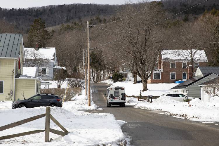 The MOOver microtransit bus drives up the road after dropping off a passenger in Windsor, Vt., on Tuesday, Jan. 31, 2023. As of Tuesday, the bus has provided 54 rides since the program began on January 23. (Valley News / Report For America - Alex Driehaus) Copyright Valley News. May not be reprinted or used online without permission. Send requests to permission@vnews.com.