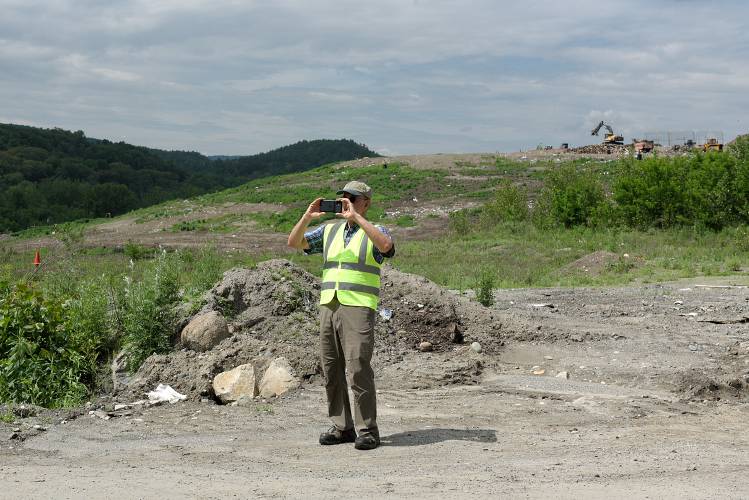 Bob Cheney, whose wife is a member of the Bow Recycling and Solid Waste Committee, photographs the food composting facility at the Lebanon (N.H.) Landfill, on Thursday, June 16, 2023. (Valley News - James M. Patterson) Copyright Valley News. May not be reprinted or used online without permission. Send requests to permission@vnews.com.
