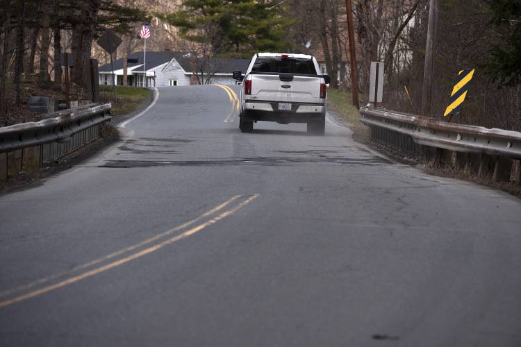 A truck travels down Trues Brook Road in Lebanon, N.H., on Monday, April 15, 2024. The Lebanon City Council will vote on a plan to widen Trues Brook Road Bridge, as well as 2,000 feet of roadway, to provide safer use by pedestrians and cyclists. (Valley News - Jennifer Hauck) Copyright Valley News. May not be reprinted or used online without permission. Send requests to permission@vnews.com.