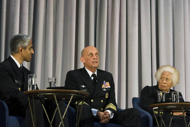 Former Surgeon General Richard Carmona, middle, speaks about his son, an Iraq War veteran, and his struggles with PTSD during a roundtable on mental health with Surgeon General, Vice Admiral Vivek Murthy, and five more former surgeons general, including Joycelyn Elders, right, at Leede Arena in Hanover, N.H., on Thursday, Sept. 28, 2023. (Valley News - James M. Patterson) Copyright Valley News. May not be reprinted or used online without permission. Send requests to permission@vnews.com.